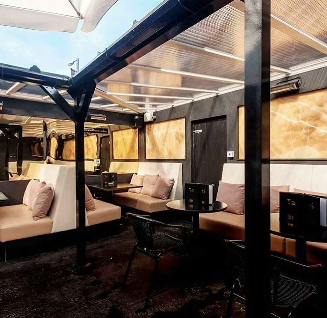 Ground floor bar and outdoor area. Upstairs VIP and Roof Terrace 1