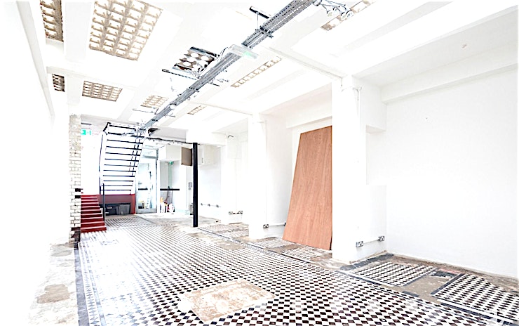 Shoreditch Creativity This unusual, mixed use space is right next to Spitalfields Market, The Ten Bells Pub and close to the foot of busy Brick Lane. Once upon a time it was a public toilet, but with a location poised to a